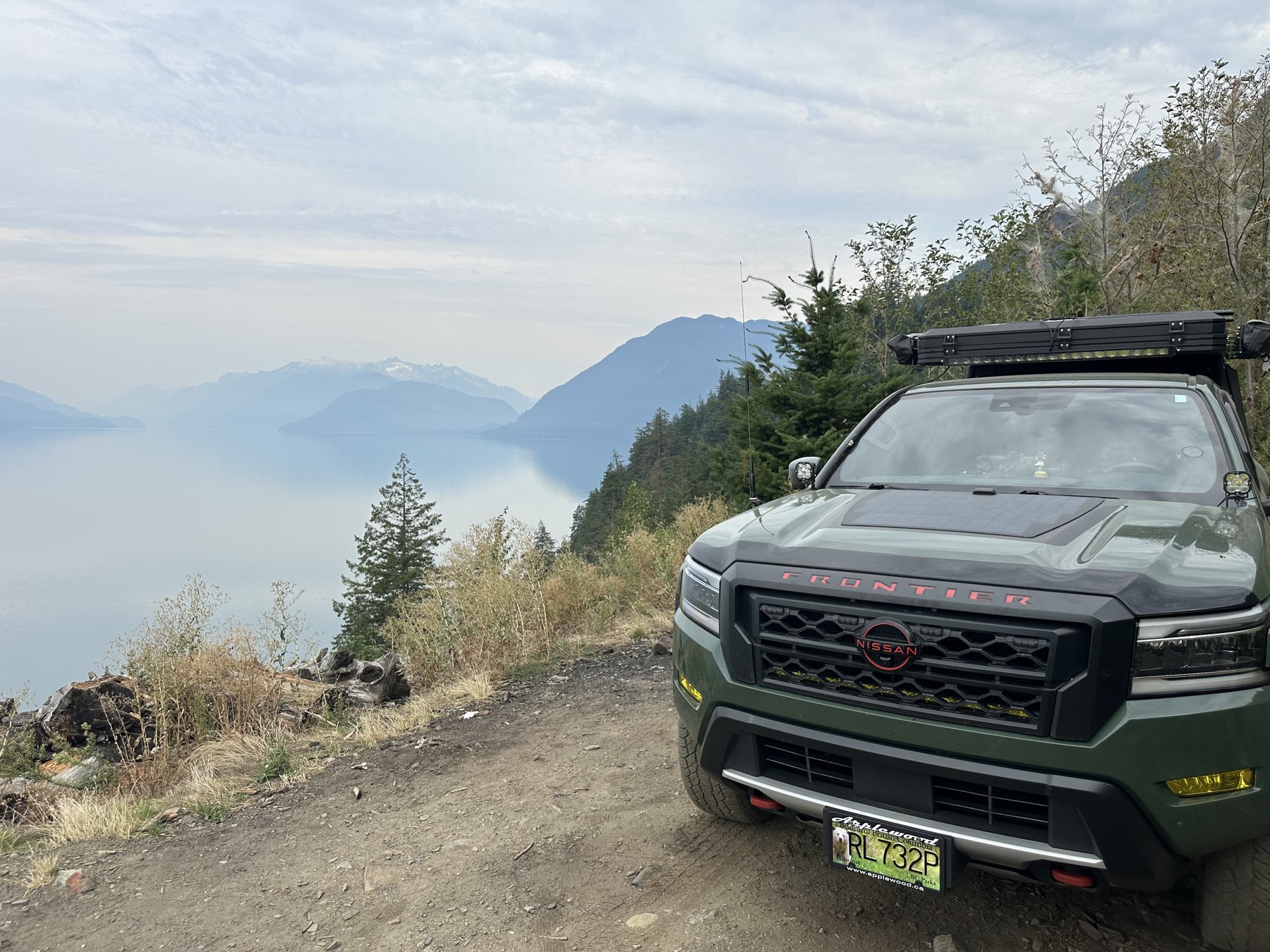 Truck overlooking a mountain lake