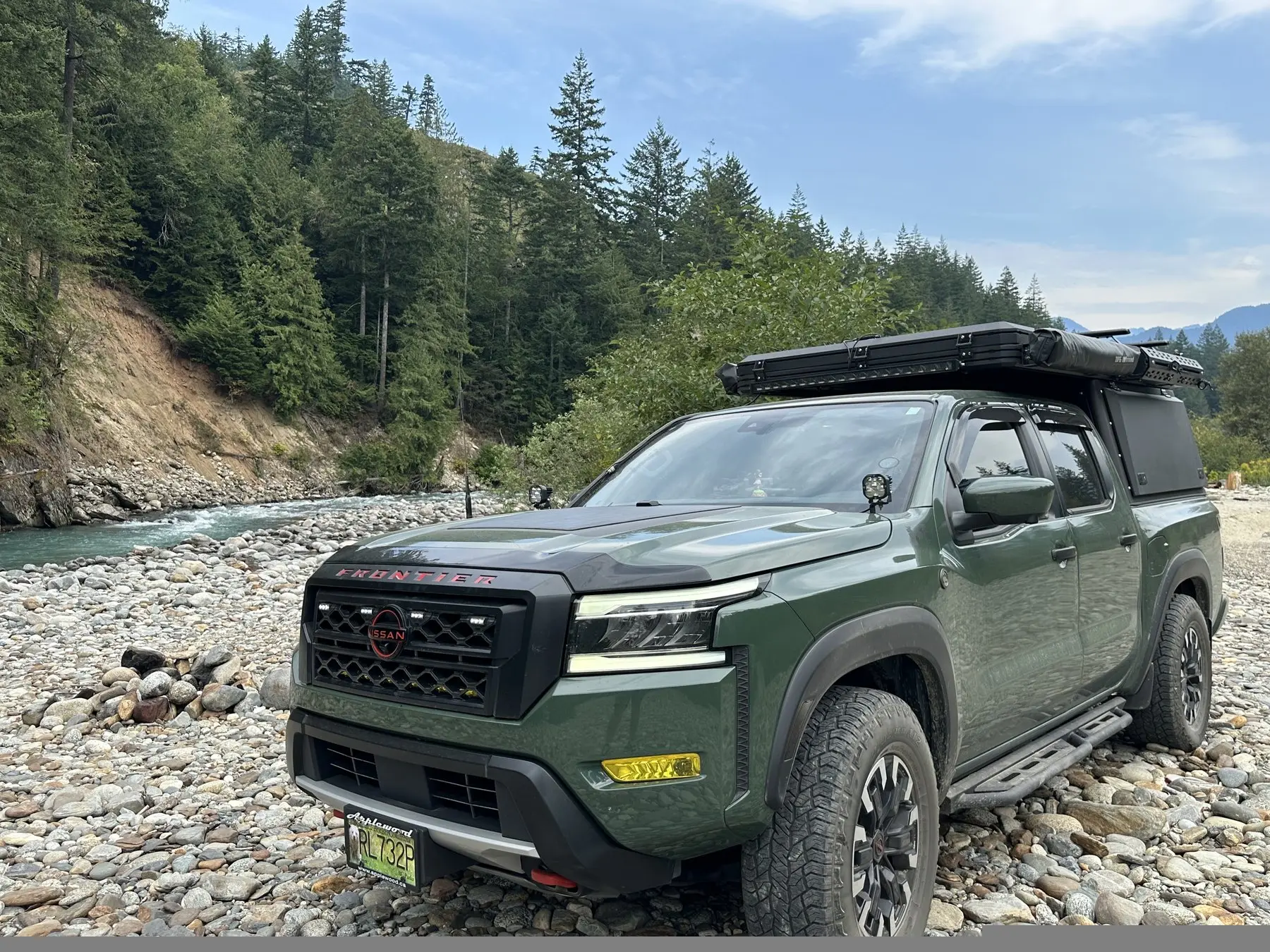 Frontier parked on a rocky riverbed