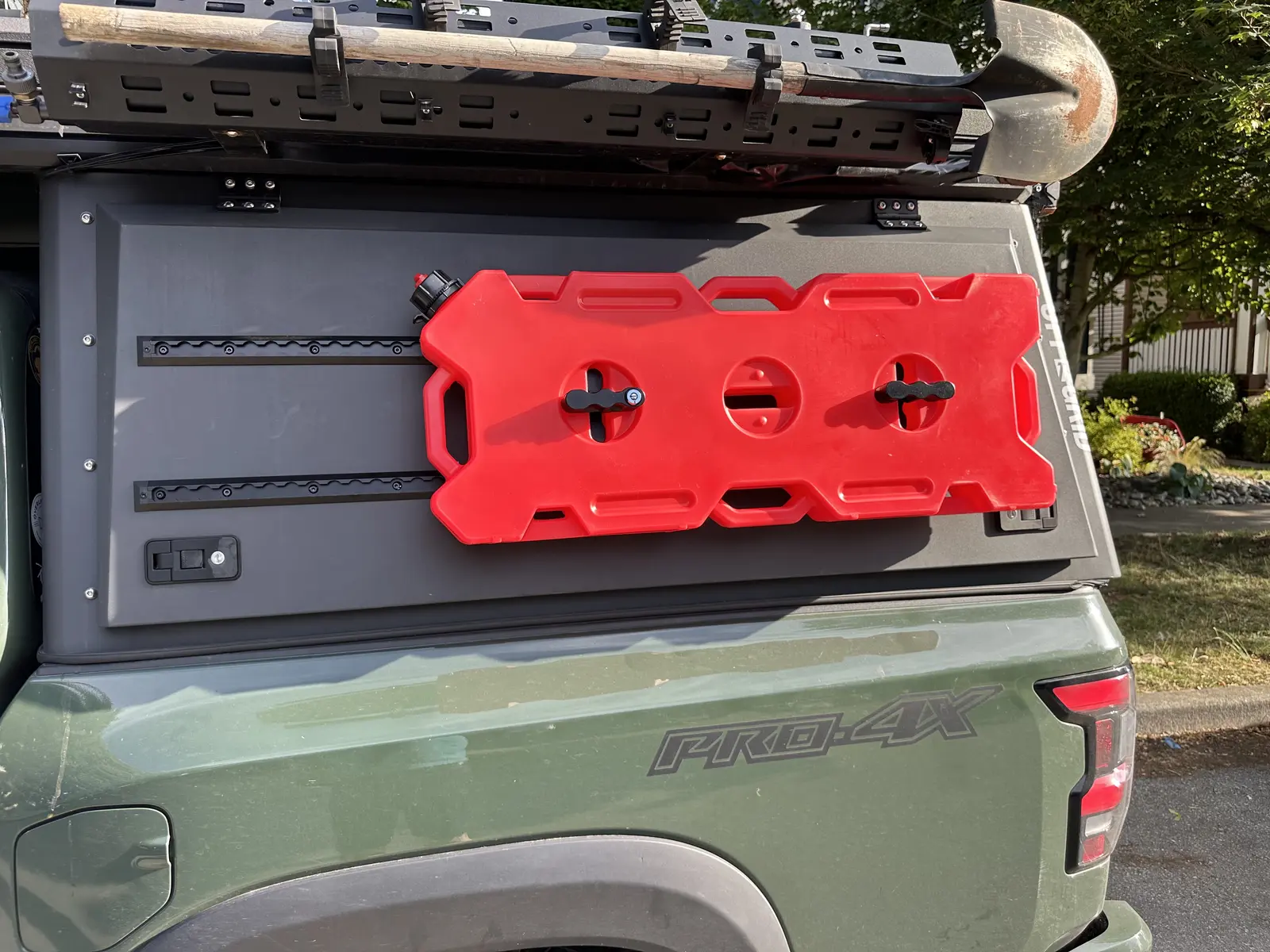 Red traction boards mounted outside the canopy